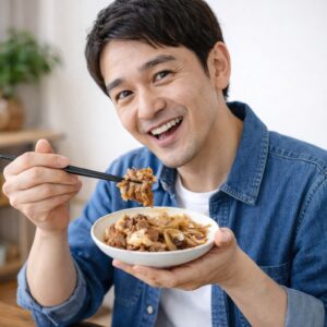 食べ物ギフトを食べる男性